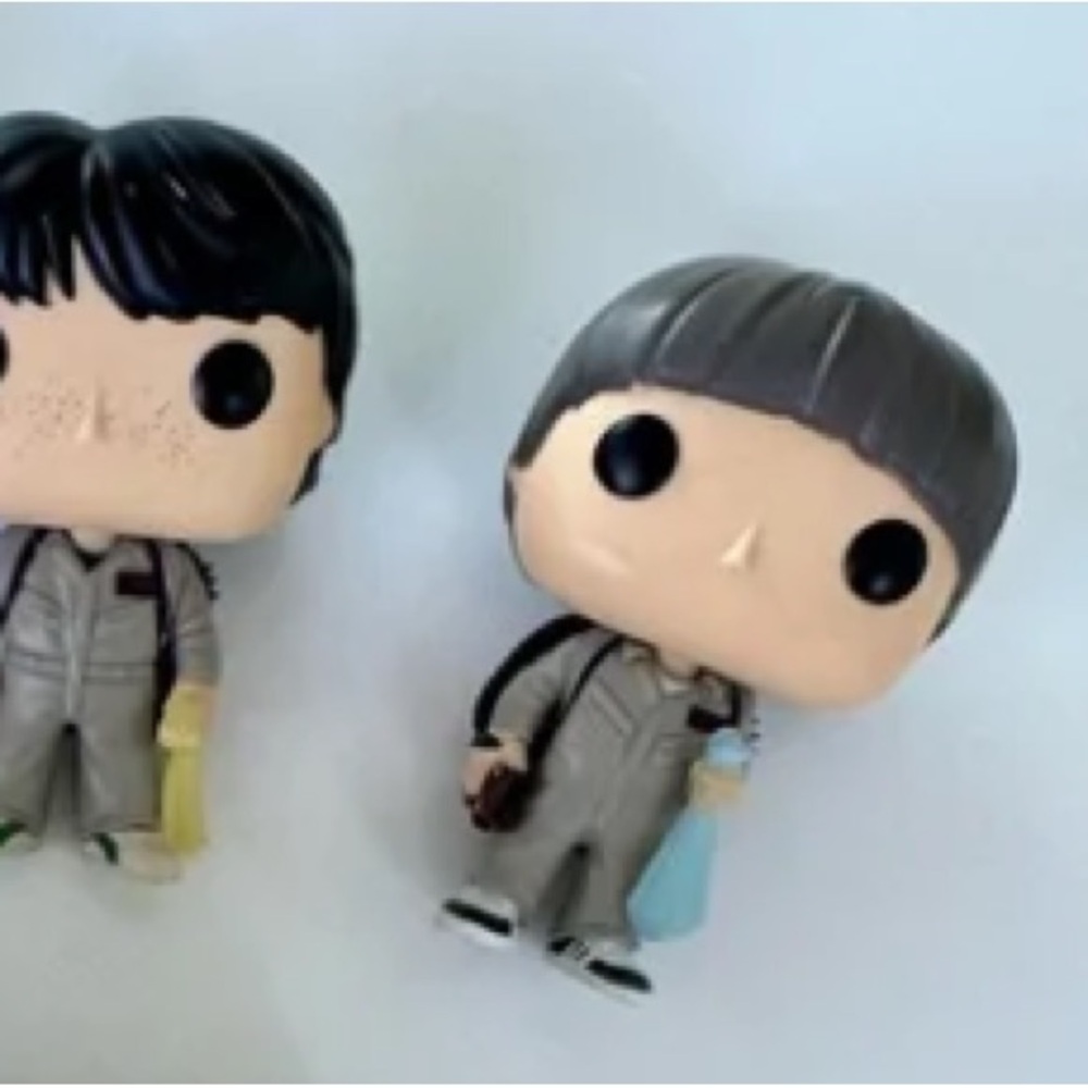 Funko Action Figures with Black and Gray Hair